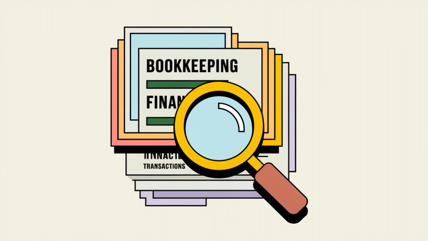 A magnifying glass inspecting organized financial documents.