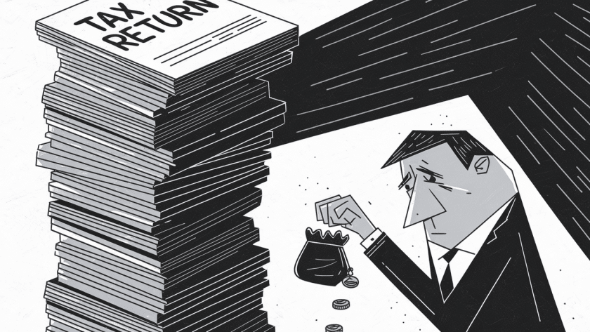 A worried taxpayer overshadowed by a large stack of tax paperwork.